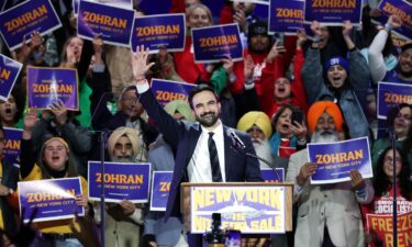 New York City mayoral candidate Zohran Mamdani waves during a campaign rally at Forest Hills Stadium in the Queens borough of New York on October 26