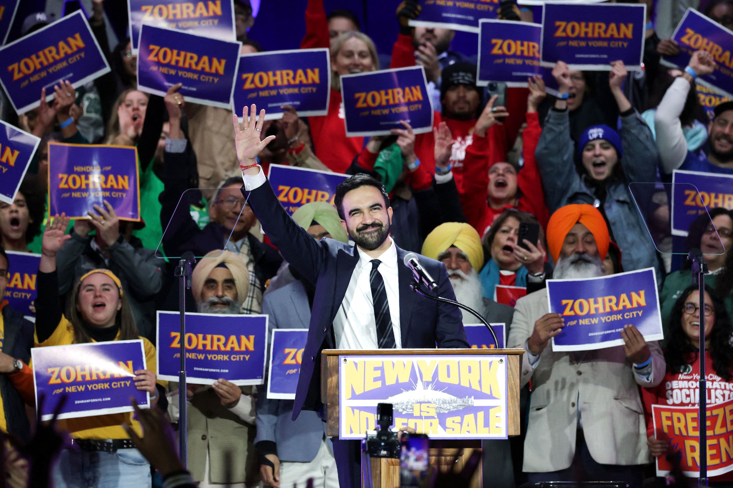 <i>Angela Weiss/AFP/Getty Images via CNN Newsource</i><br/>New York City mayoral candidate Zohran Mamdani waves during a campaign rally at Forest Hills Stadium in the Queens borough of New York on October 26