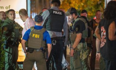 FBI and Border Patrol officers arrest a man after he threw a sandwich at law enforcement along the U Street corridor in Washington