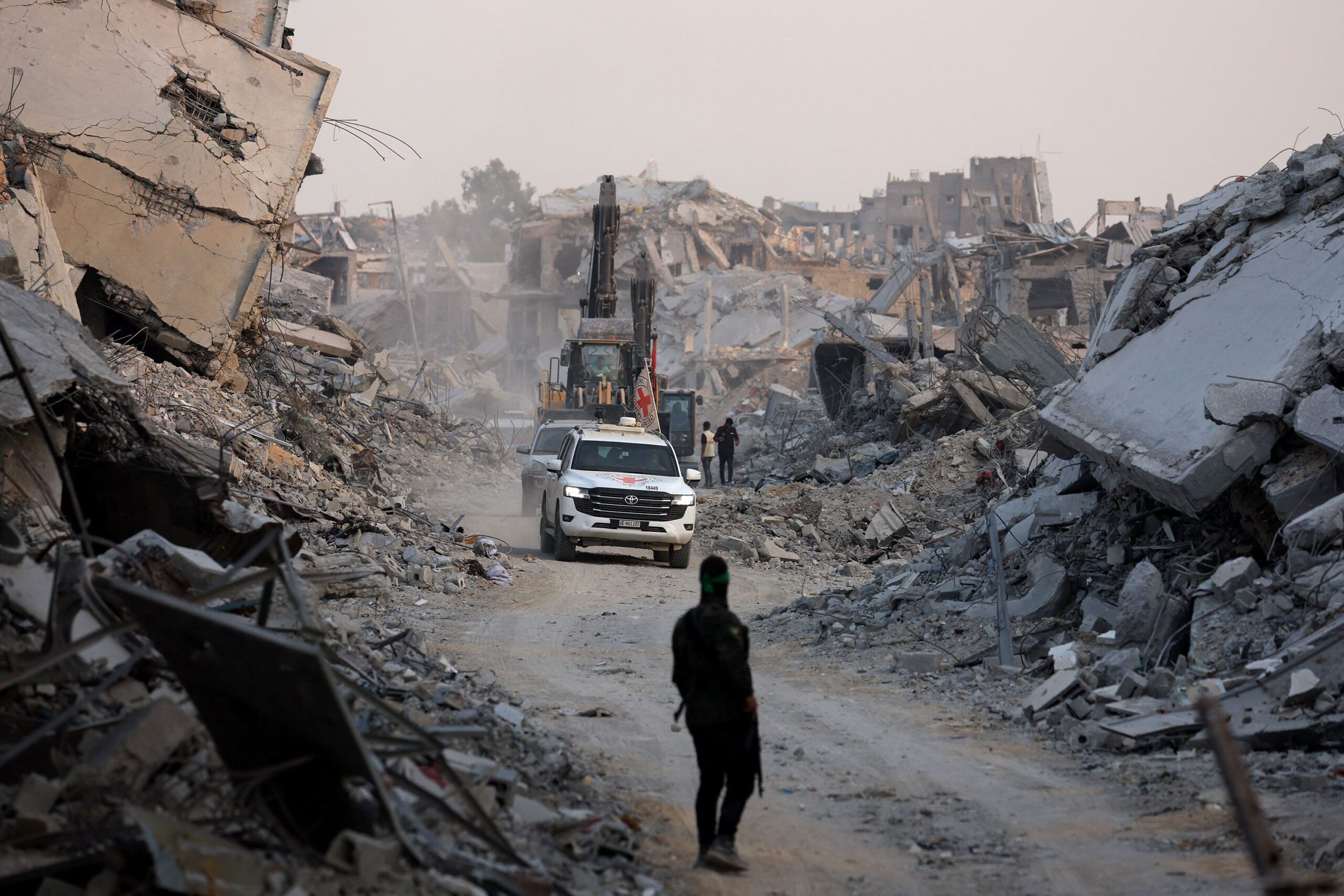<i>Dawoud Abu Alkas/Reuters via CNN Newsource</i><br/>Red Cross vehicles drive through Gaza City before returning what was said to be the body of a deceased hostage held by Hamas to Israel on Tuesday.