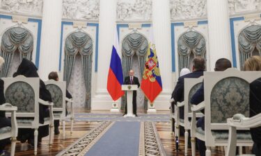 Russian President Vladimir Putin gives a speech during an awards ceremony marking the National Unity Day at the Kremlin in Moscow
