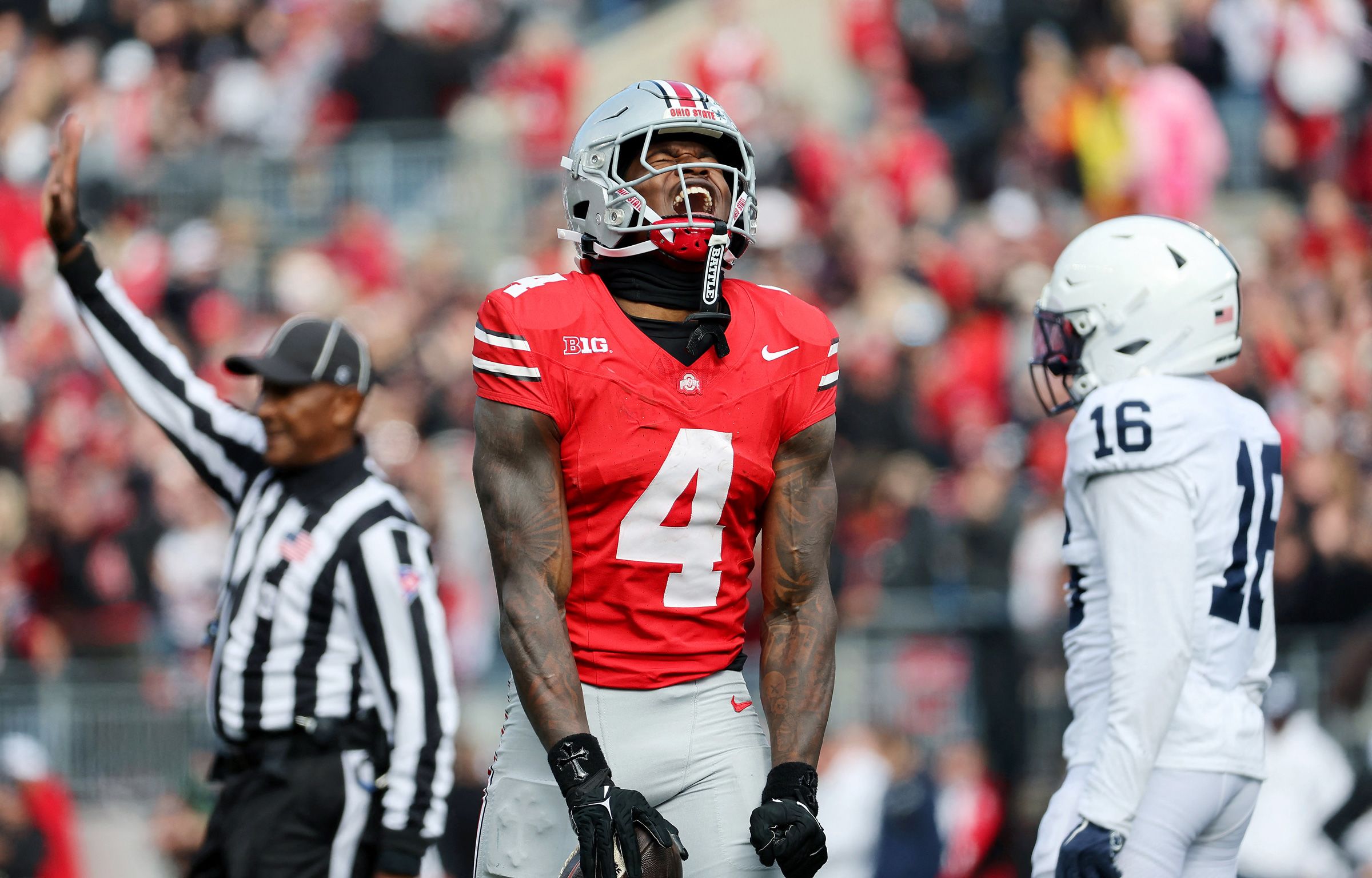 <i>Joseph Maiorana/Imagn Images/Reuters via CNN Newsource</i><br/>Ohio State Buckeyes wide receiver Jeremiah Smith (4) celebrates a long pass reception during the third quarter against the Penn State Nittany Lions on November 1.