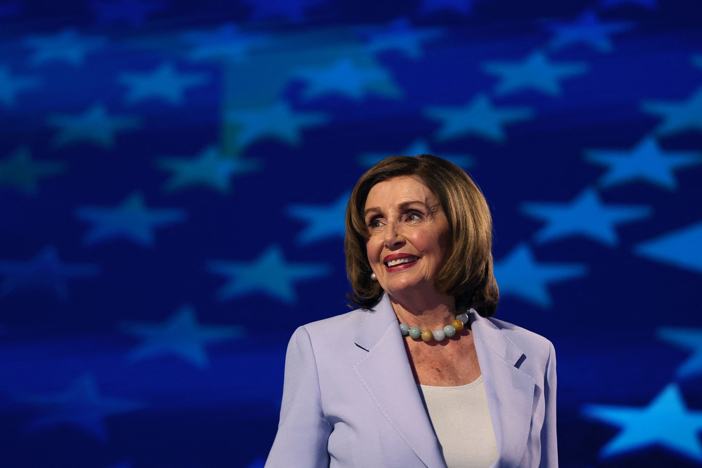 <i>Kevin Wurm/Reuters via CNN Newsource</i><br/>Rep. Nancy Pelosi akes the stage at the Democratic National Convention in Chicago