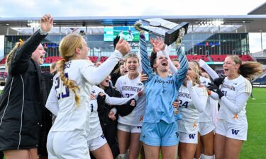 Jadyn Holdenried reveals "For Mia" on her shirt after scoring in the penalty shootout against Michigan State.