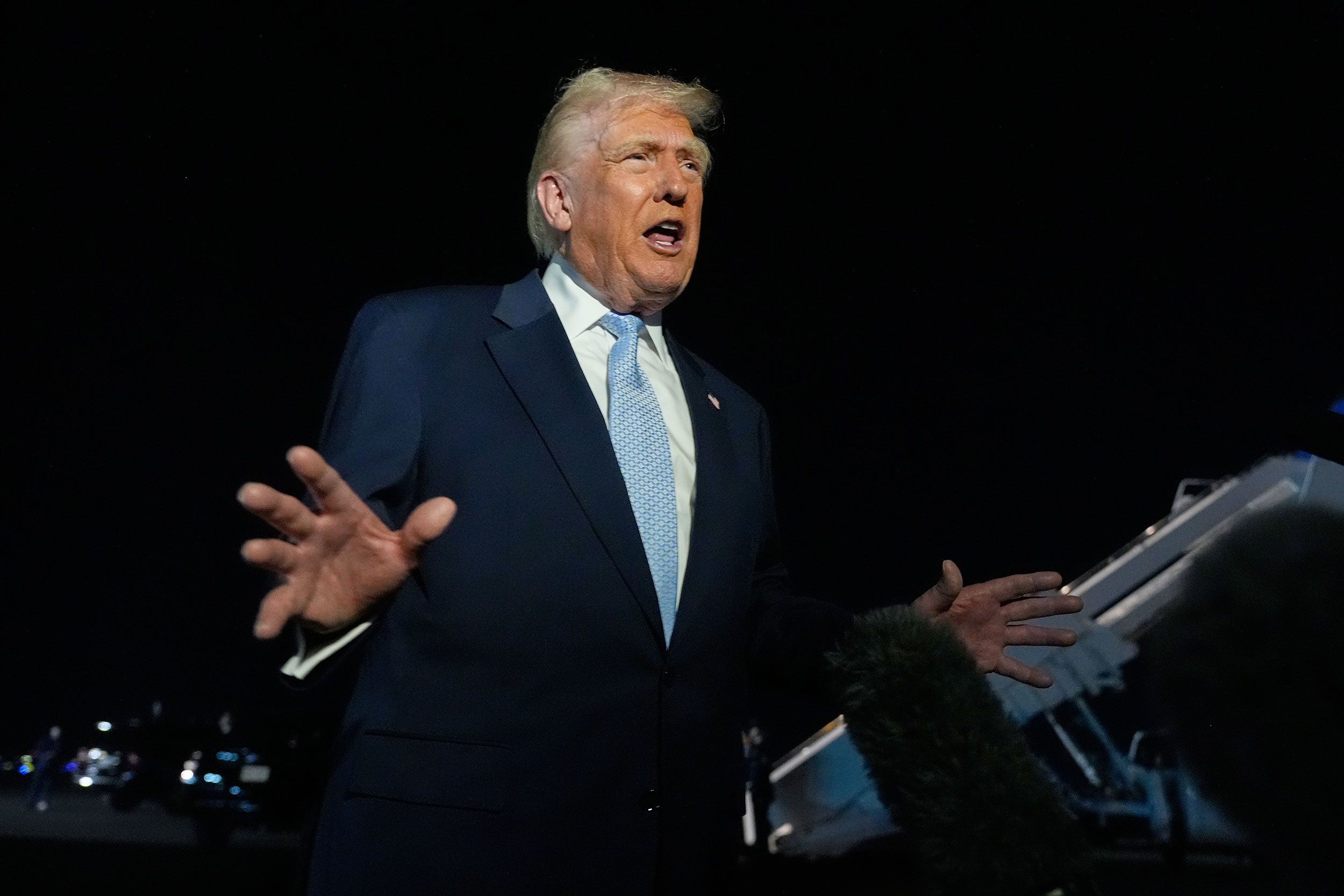 <i>Manuel Balce Ceneta/AP via CNN Newsource</i><br/>President Donald Trump speaks to reporters before boarding Air Force One at Palm Beach International Airport in West Palm Beach