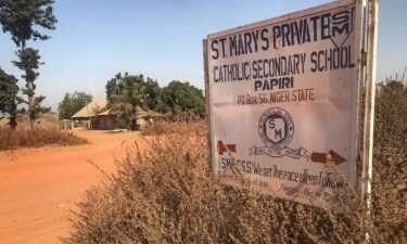A signboard for St. Mary's Private Catholic School stands at the entrance of the school in Papiri
