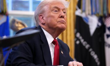 President Donald Trump delivers remarks in the Oval Office of the White House on November 21