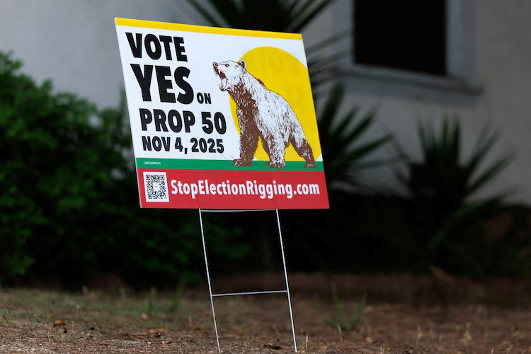 A sign supporting Proposition 50, aimed at countering Republican-led redistricting in Texas by redrawing California's congressional map to favor Democrats, is shown in a residential neighborhood in Encinitas, Calif., Sept. 29, 2025.