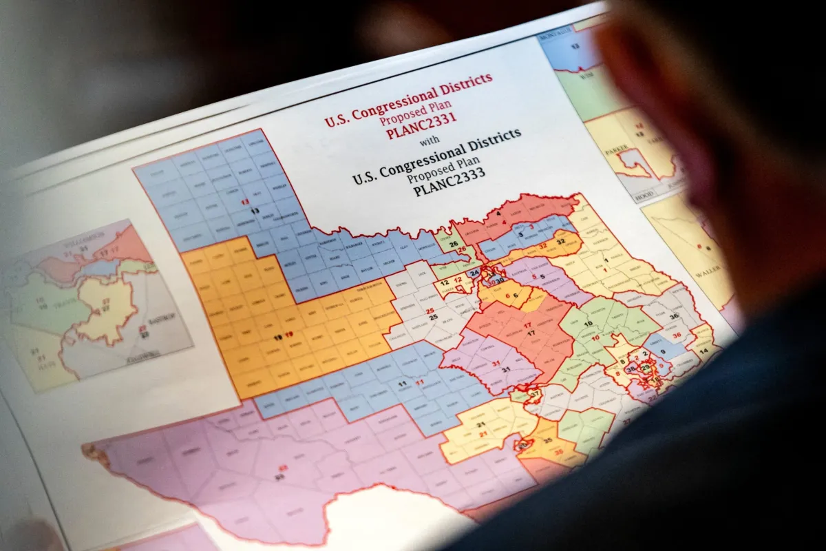 State Rep. Matt Morgan, R-Richmond, surveys a map of proposed new congressional districts in Texas, as Democratic lawmakers, who left the state to deny Republicans the opportunity to redraw the state's 38 congressional districts, began returning to the Texas Capitol in Austin on Aug. 20, 2025.