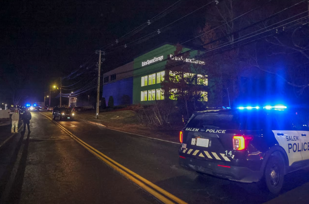 <i>Matthew J. Lee/The Boston Globe/Getty Images via CNN Newsource</i><br/>Police on scene at the Extra Space Storage facility where the Brown University shooting suspect was found dead on Thursday.