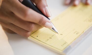 The Federal Reserve says it is considering "winding down" its processing of paper checks for banks and their customers.