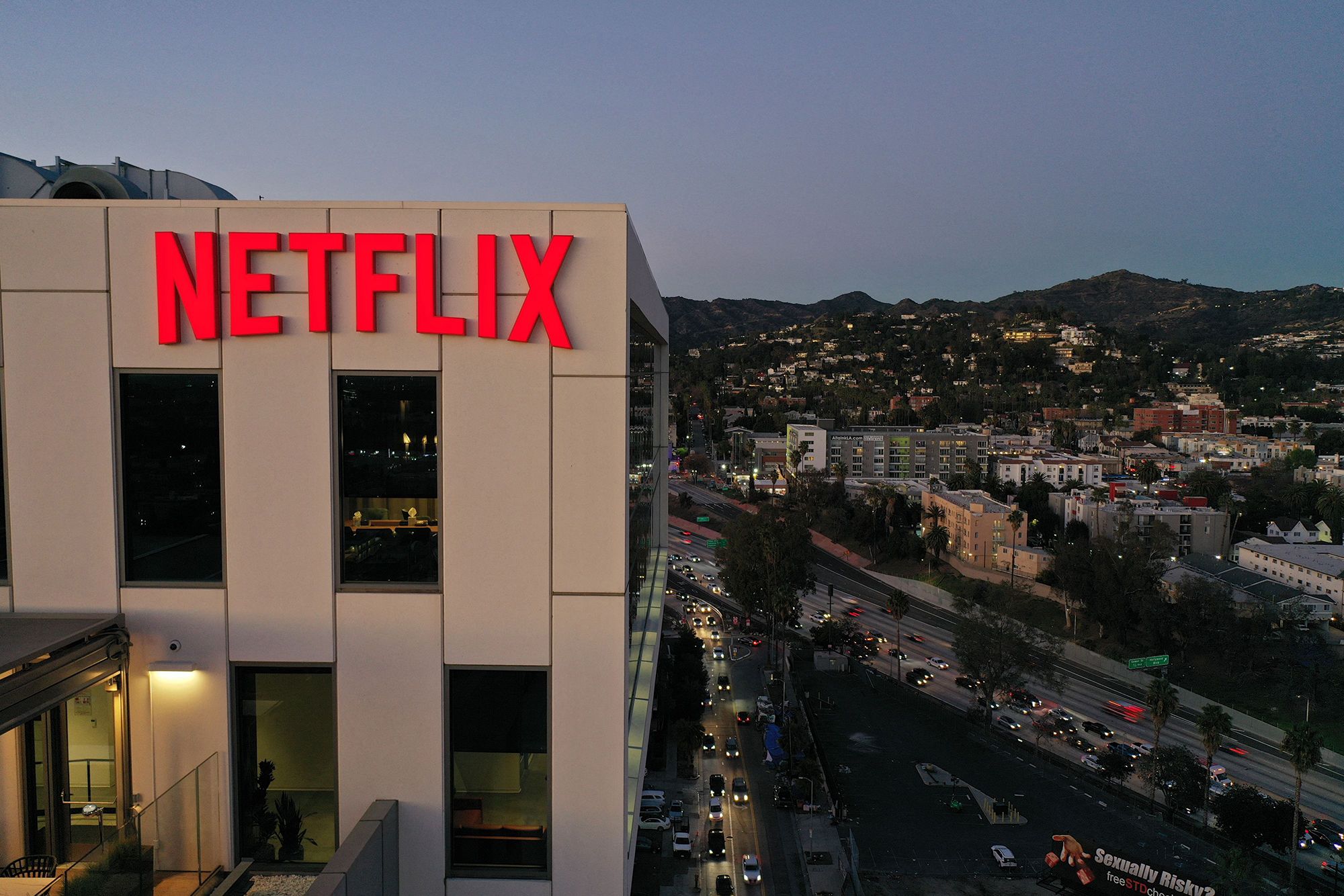<i>Roby Beck/AFP/Getty Images via CNN Newsource</i><br/>The Netflix logo is seen on top of their office building in Hollywood