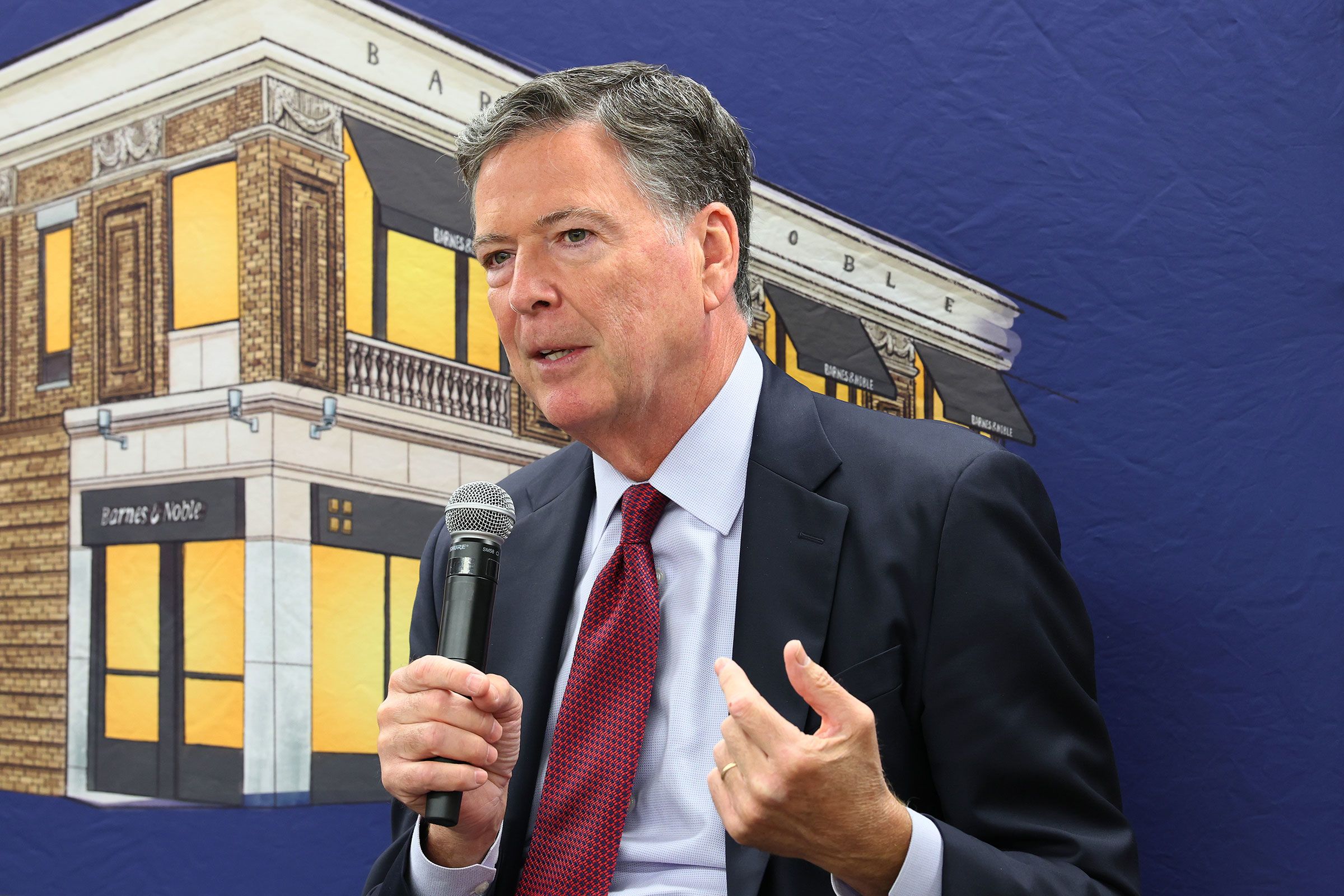<i>Michael M. Santiago/Getty Images via CNN Newsource</i><br/>Former FBI Director James Comey speaks at an event at the Barnes & Noble Upper West Side in New York