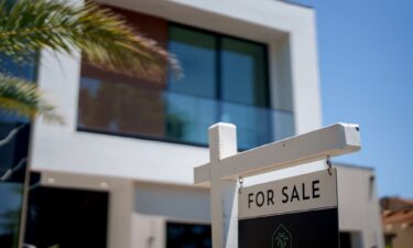 A "For Sale" sign in front of a home in the Encino neighborhood of Los Angeles