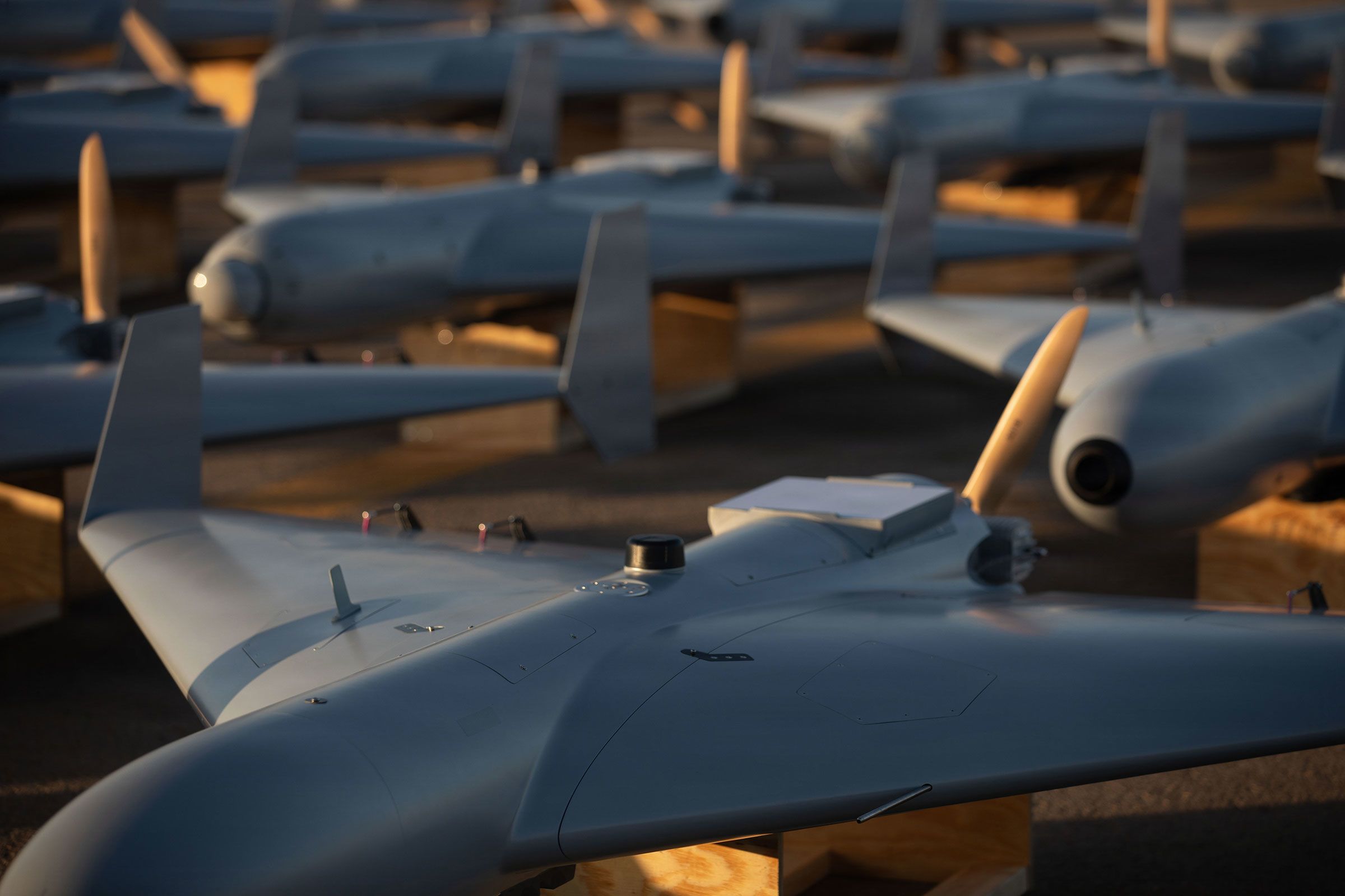 <i>US Central Command Public Affairs via CNN Newsource</i><br/>Unmanned Combat Attack System (LUCAS) drones are positioned on the tarmac at an undisclosed base in the US Central Command operating area