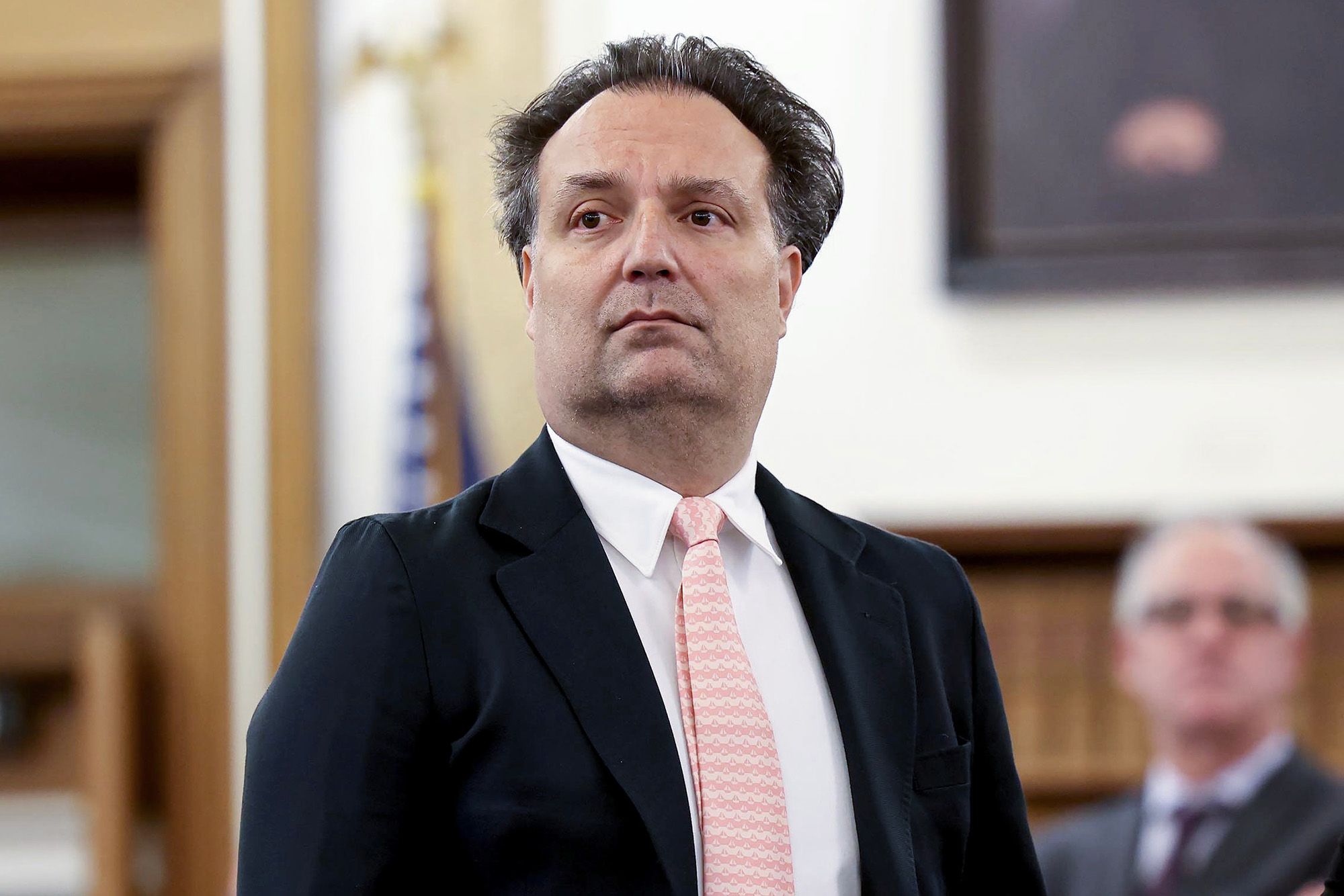 <i>Suzanne Kreiter/The Boston Globe/AP via CNN Newsource</i><br/>Brian Walshe watches security footage from at a HomeGoods store that was shown during his murder trial.