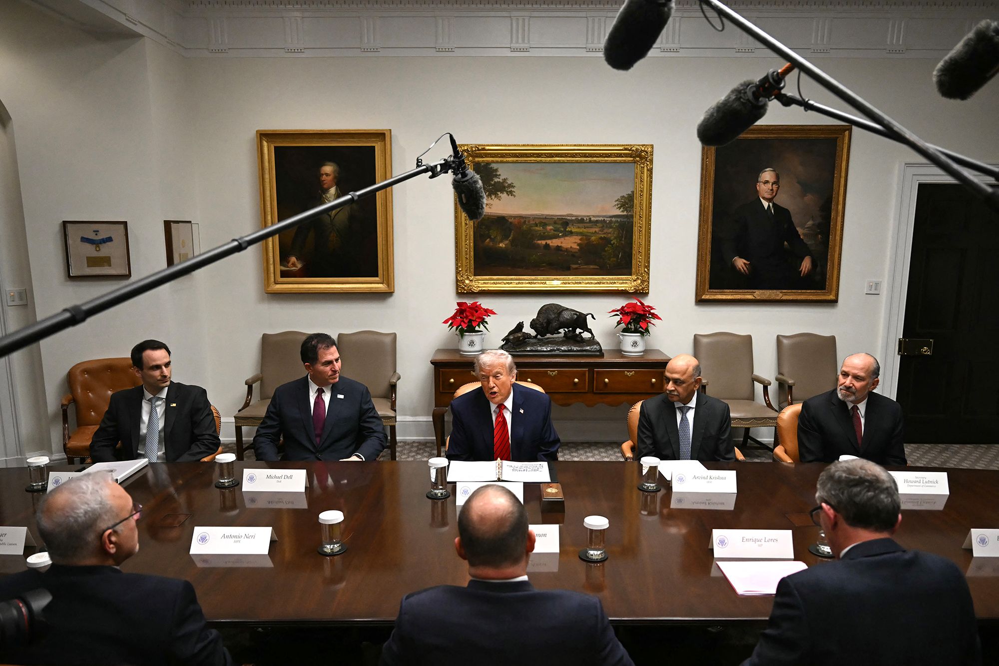 <i>Andrew Caballero-Reynolds/AFP/Getty Images via CNN Newsource</i><br/>President Donald Trump speaks during a roundtable discussion in the Roosevelt Room of the White House on December 10.