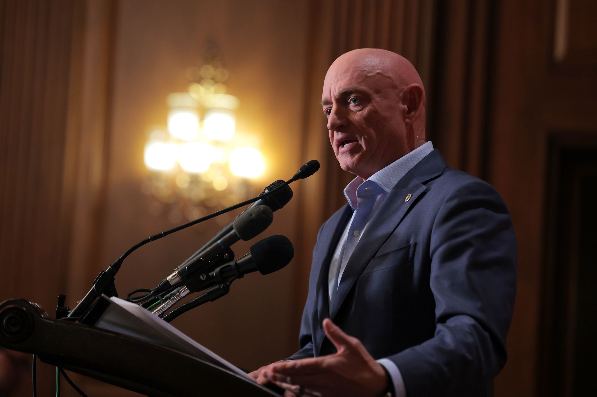 <i>Anna Moneymaker/Getty Images via CNN Newsource</i><br/>U.S. Sen. Mark Kelly speaks at a news conference in the U.S. Capitol on December 1