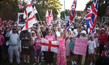 Local women wore pink to protest outside the Bell Hotel in Epping on August 8.