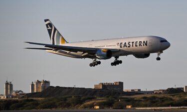 An Eastern Airlines plane carrying Venezuelan migrants repatriated from the US lands at Simon Bolivar International Airport in Maiquetia