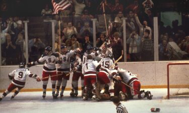 The U.S. hockey team pounces on goalie Jim Craig after a 4-3 victory against the Soviets in the 1980 Olympics