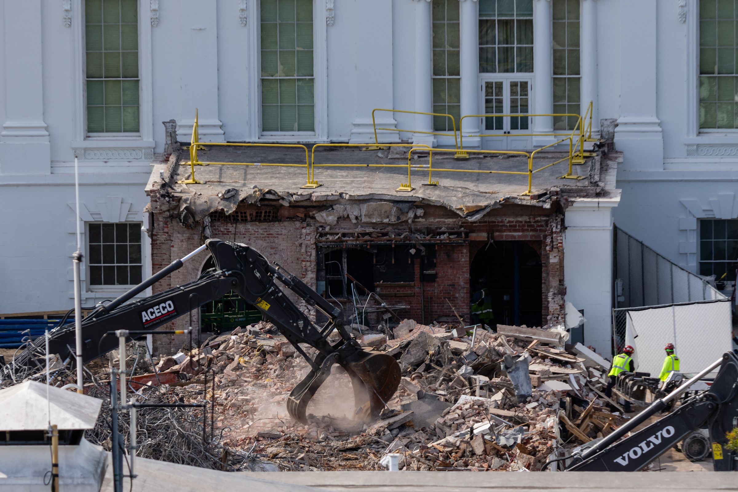<i>Eric Lee/Getty Images via CNN Newsource</i><br/>An excavator works to clear rubble after the demolition of the East Wing of the White House