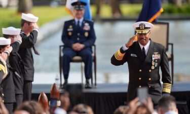 Navy Adm. Alvin Holsey salutes during a relinquishment of command and retirement ceremony at US Southern Command in Doral