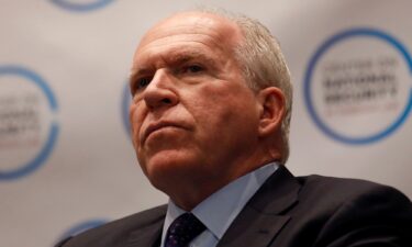 Former CIA director John Brennan listens during a panel at The Center on National Security at Fordham Law School in Manhattan