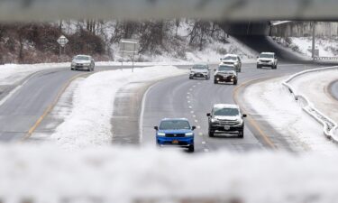 Traffic moves along southbound Interstate 684 in snowy Katonah