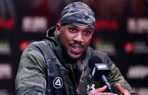 Boxer Anthony Joshua speaks at a press conference after Jake Paul v Anthony Joshua at Kaseya Center in Miami
