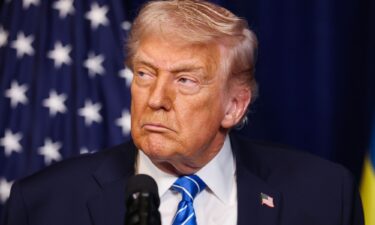 U.S. President Donald Trump listens during a press conference with Ukrainian President Volodymyr Zelensky following their meeting at Trump’s Mar-a-Lago club on December 28