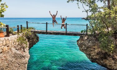Tourists cruise past the Fjord Calvo near Puerto Natales