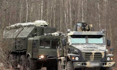 Military personnel take part in the deployment of a Russian Oreshnik missile system at an unidentified location in Belarus