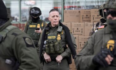 US Border Patrol commander Gregory Bovino confronts demonstrators outside an immigrant processing center in September 2025