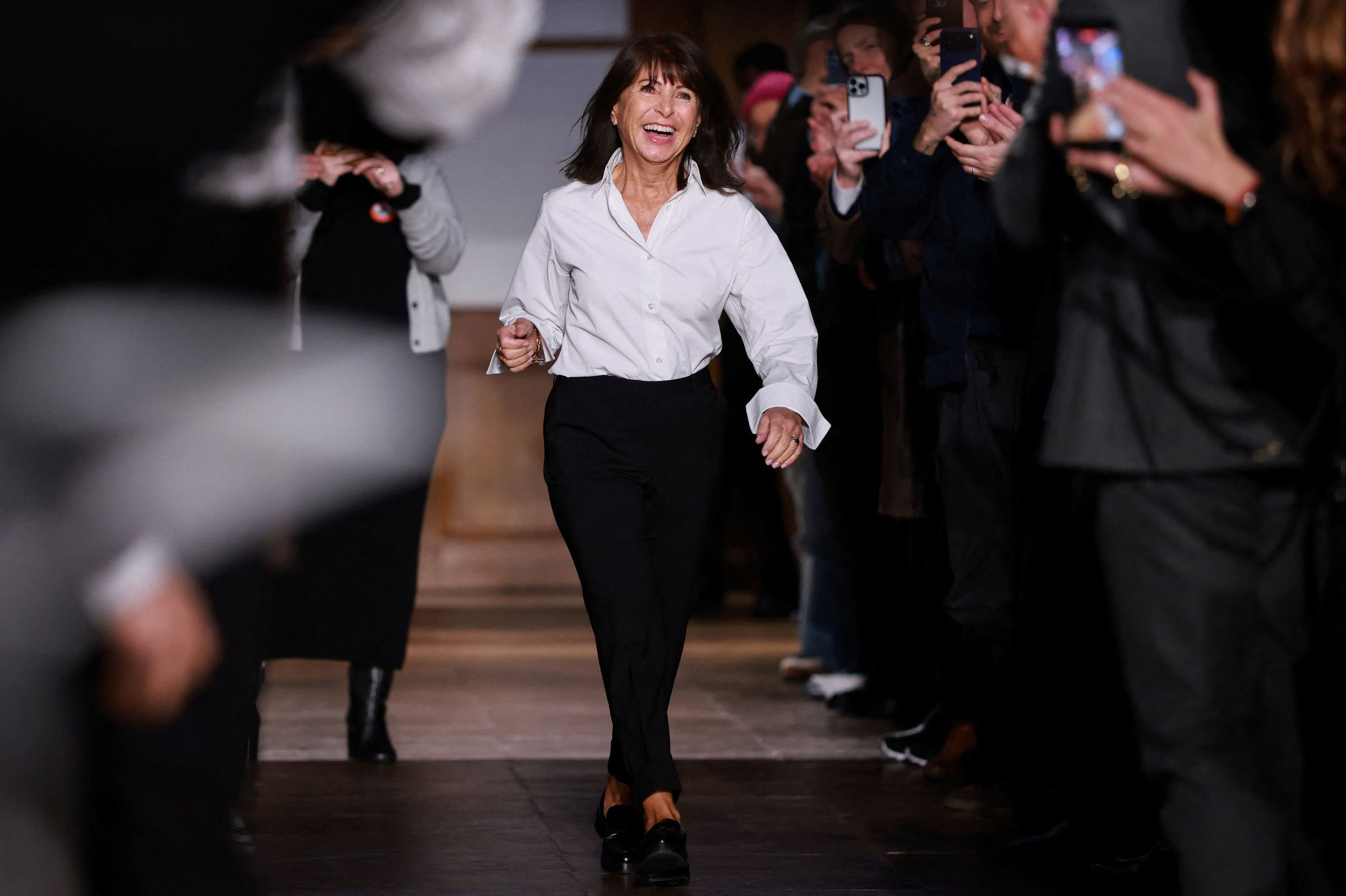 <i>Stephanie Lecocq/Reuters via CNN Newsource</i><br/>Designer Veronique Nichanian reacts following her Menswear Fall/Winter 2026-2027 collection show for fashion house Hermes during Men's Fashion Week in Paris
