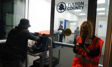 This November 2024 photo shows ballots arriving at the Fulton County Elections Hub and Operation Center in Fairburn