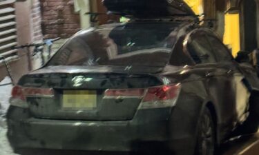 A man passes the Chabad-Lubavitch World Headquarters in the Crown Heights neighborhood of Brooklyn