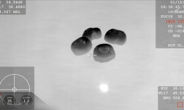 SpaceX Dragon capsule splashes down.