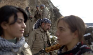 Members of the Kurdistan Democratic Party of Iran (KDPI) participate in a military drill in an outpost near Erbil