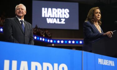 Vice President Kamala Harris and Minnesota Gov. Tim Walz appear on stage together during a campaign event in Philadelphia on August 6