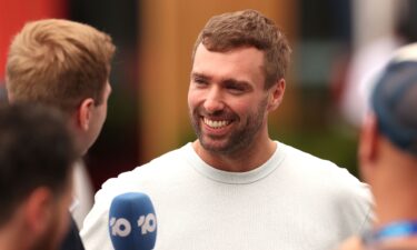 Italy's Jannik Sinner embraces Smith during the One-Point Slam exhibition event.