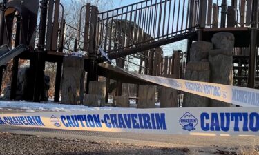 Tape sections off a playground in Brooklyn