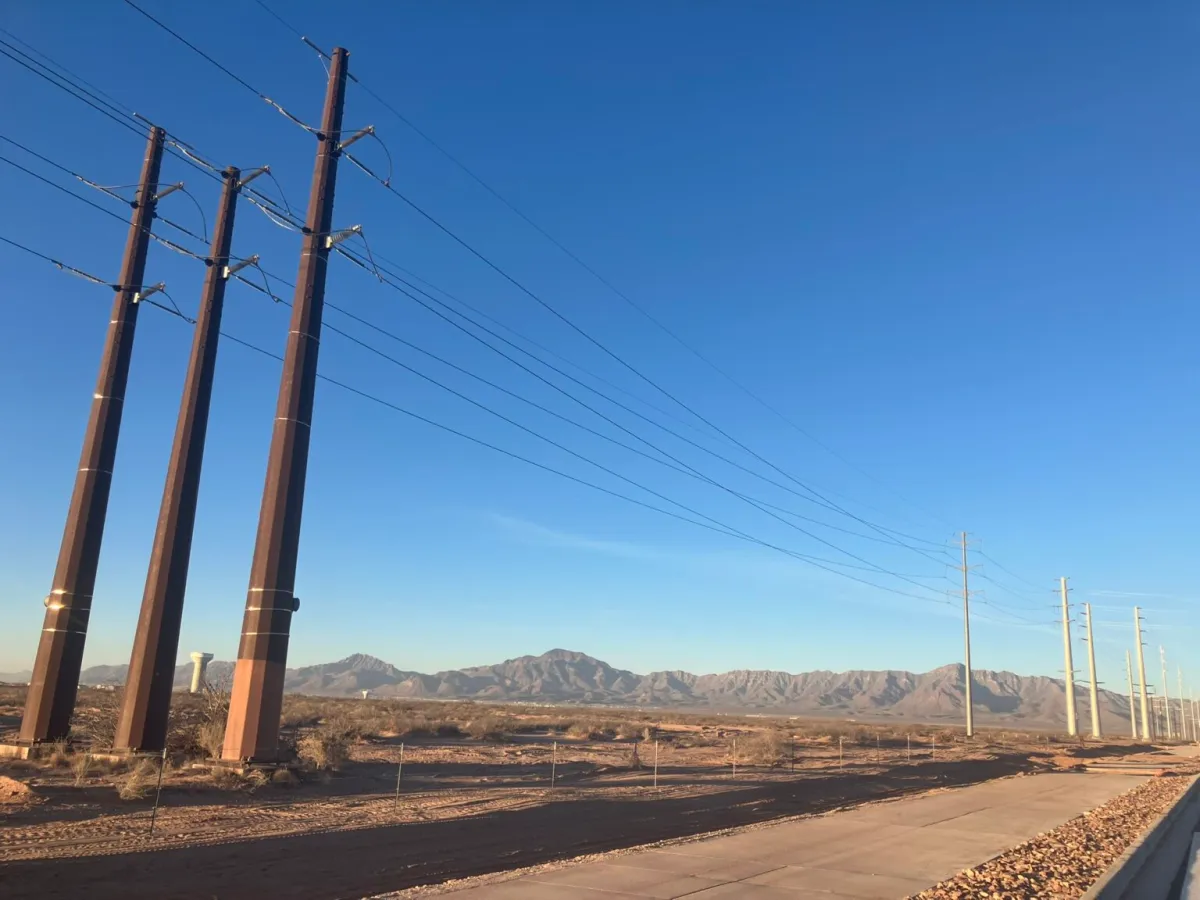 Transmission lines along Stan Roberts Sr. Avenue in El Paso, adjacent to the construction site of the Meta data center.