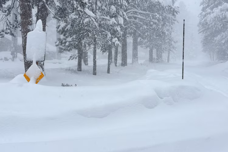 Snow falls on Tuesday in Truckee, California. Crews were looking for multiple backcountry skiers feared missing after a reported avalanche.