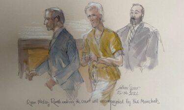 Ryan Wesley Routh enters the court accompanied by federal marshals