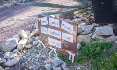 A sign is posted outside the home of Nancy Guthrie