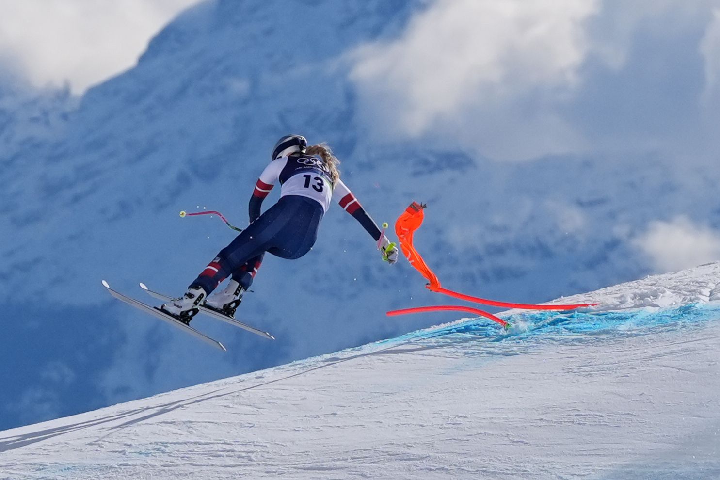 <i>Jacquelyn Martin/AP via CNN Newsource</i><br/>United States' Lindsey Vonn crashes into a gate during an alpine ski women's downhill race at the 2026 Winter Olympics.