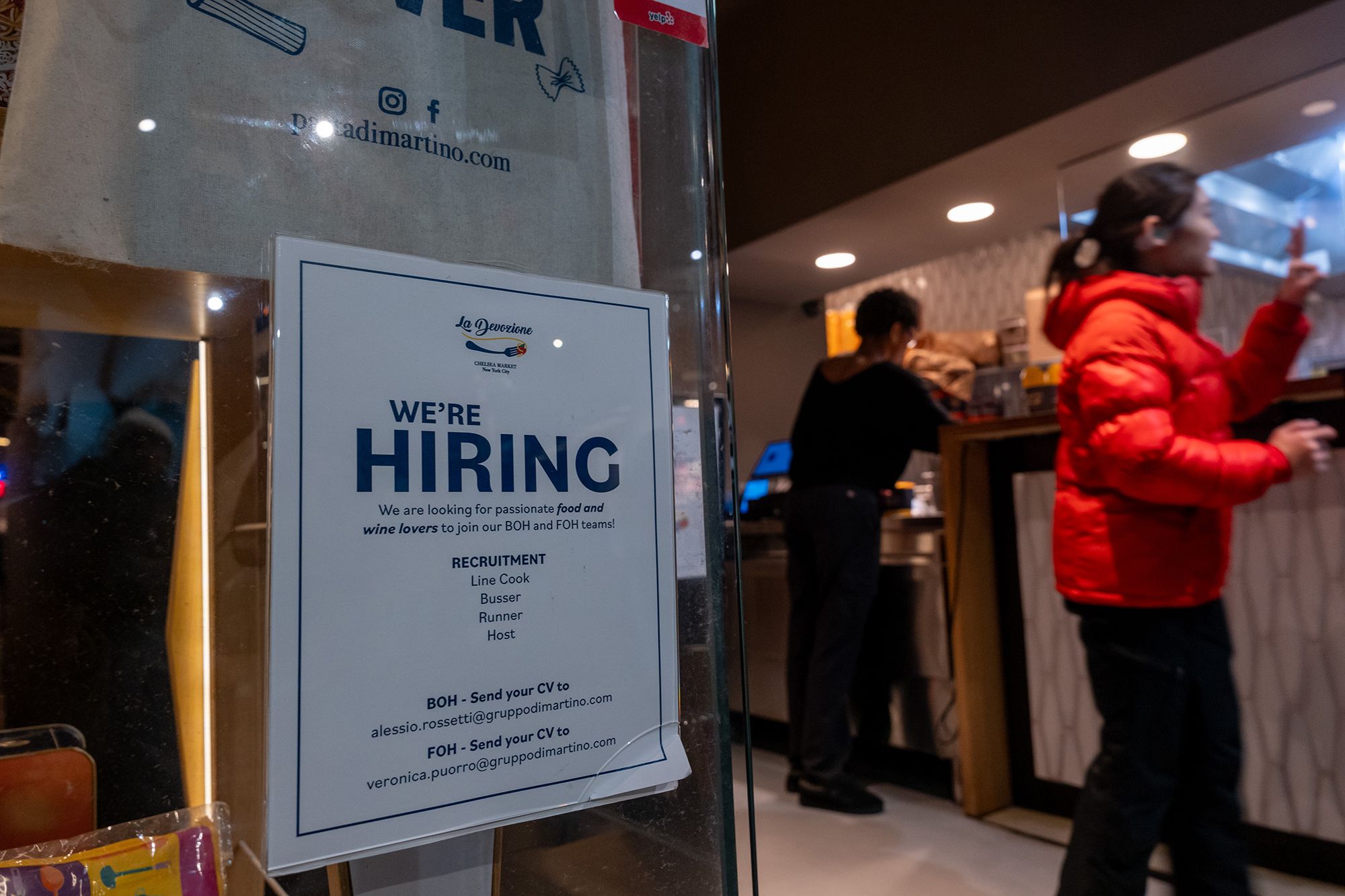 <i>Spencer Platt/Getty Images via CNN Newsource</i><br/>A restaurant displays a 'hiring' sign in its window in Manhattan on December 16