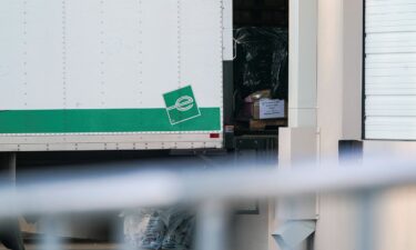 Boxes and bags sit inside a vehicle of the Federal Bureau of Investigation (FBI) outside the Fulton County Election Hub and Operation Center after the FBI executed a search warrant there in relation to the 2020 election in Union City
