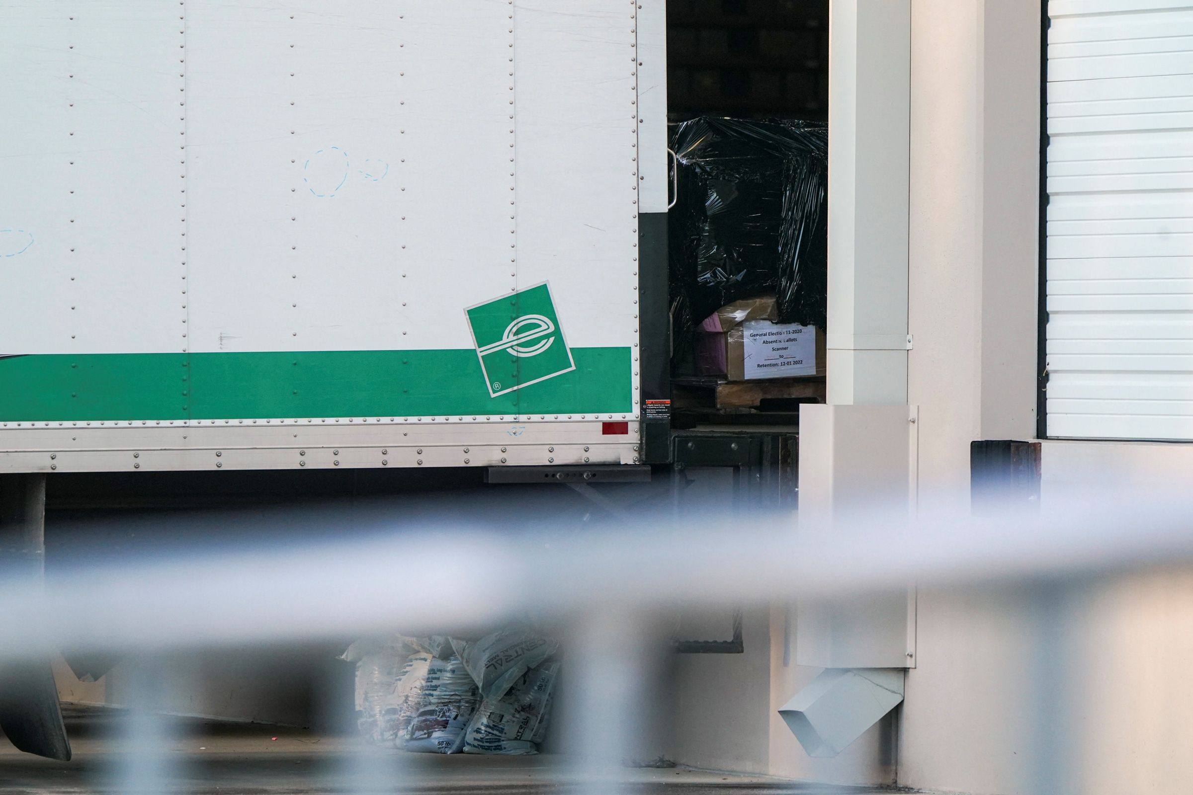 <i>Elijah Nouvelage/Reuters via CNN Newsource</i><br/>Boxes and bags sit inside a vehicle of the Federal Bureau of Investigation (FBI) outside the Fulton County Election Hub and Operation Center after the FBI executed a search warrant there in relation to the 2020 election in Union City
